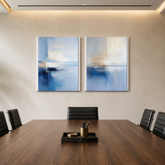 Two-panel ivory cream and blue abstract set AB529 in a corporate conference room