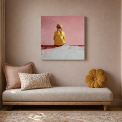 Square pink and yellow seated child portrait PE566 in a calm bedroom reading nook