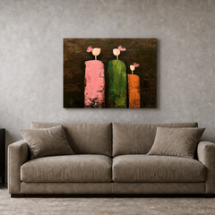 Brown pink green and orange figurative impasto wall art PE621 above a neutral sofa