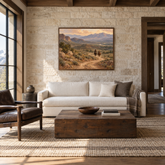 Dust and Distance Western oil painting displayed in a living room