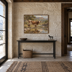 Longhorn at the Creek Western oil painting displayed in a entryway