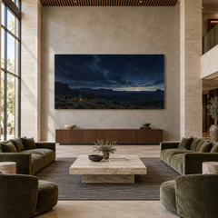 Last Watch Before Dawn above a walnut console in a spacious lobby
