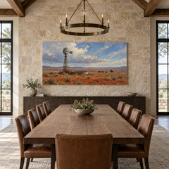 Windmill on Red Earth above a long table in a limestone and leather dining room
