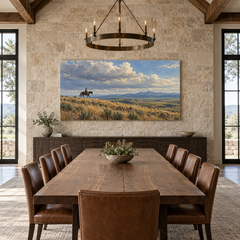 A Long Ride Across Open Range above a long table in a limestone and leather dining room