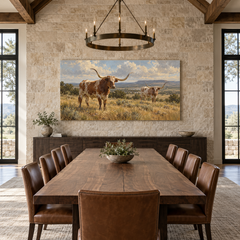 The Longhorn Study above a long table in a limestone and leather dining room