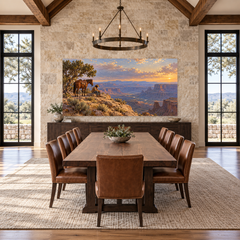 A Cowboy's Rest above a long table in a limestone and leather dining room