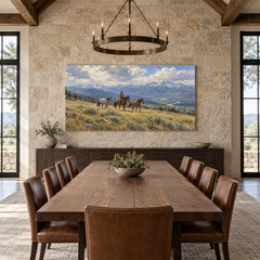 Crossing the High Meadow above a long table in a limestone and leather dining room