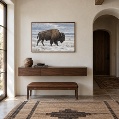 Bison on Winter Prairie oil painting displayed in a Western entryway