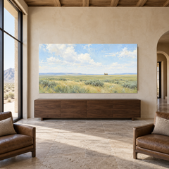 Covered Wagon Horizon oil painting displayed in a Western ranch living room