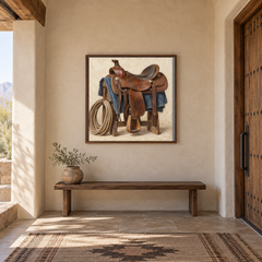 Saddle & Rope painting framed in a Southwestern entry hall