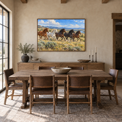 Herd Crossing the Open Range painting framed in a ranch dining room