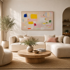 Soft pink and cream horizontal abstract painting AB452 above a neutral living room sofa