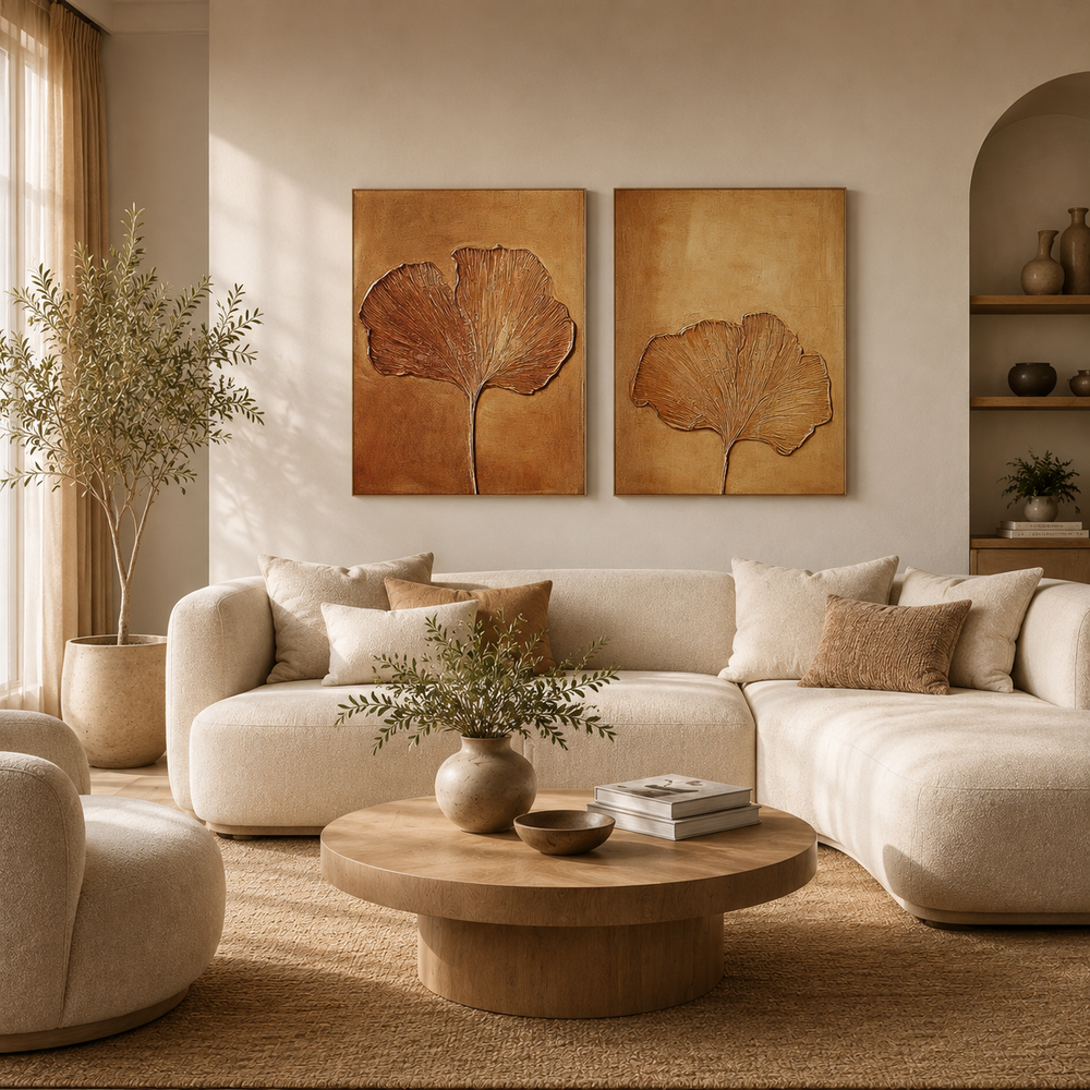 Two-piece ochre and gold ginkgo leaf wall art set FL190 above a living room sofa