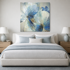 Square white icy blue and navy blossom wall art FL060 centered above a bedroom headboard