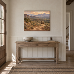 Dust and Distance Western oil painting displayed in a entryway