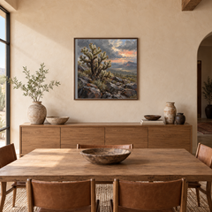 Cholla after Rain Western oil painting framed in a adobe-inspired dining room