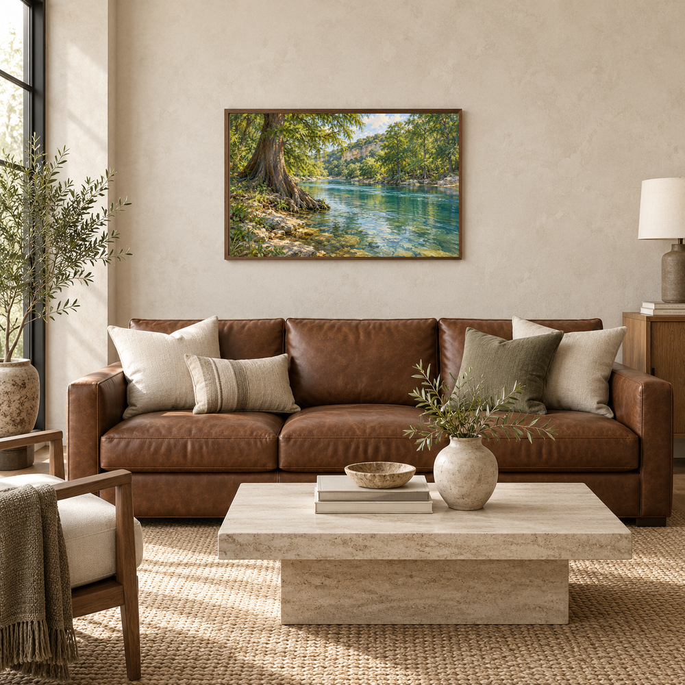 Cypress Bend river landscape above a leather living-room sofa