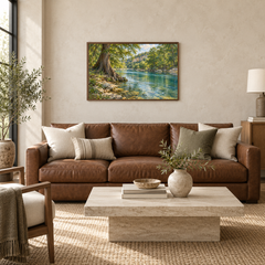 Cypress Bend river landscape above a leather living-room sofa