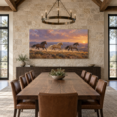 Mustang Run at Sundown above a long table in a limestone and leather dining room
