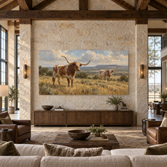 The Longhorn Study above a walnut console in a stone and leather living room