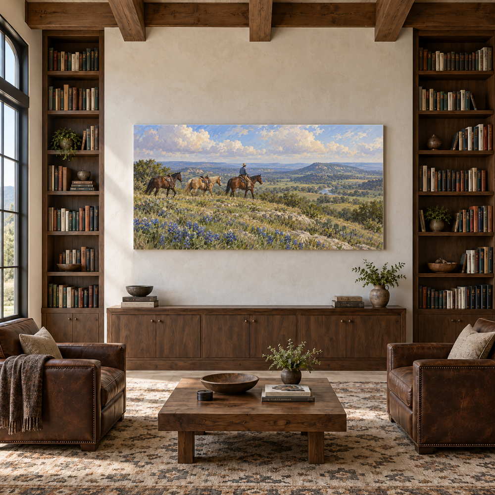 Bluebonnet Ridge above a walnut console in a library with leather armchairs