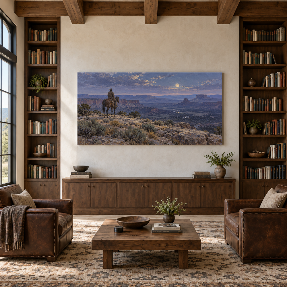 Moonrise over the Rimrock above a walnut console in a library with leather armchairs