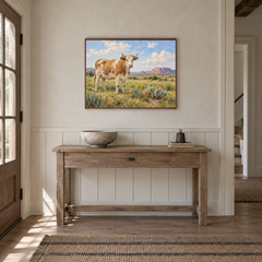 Cow in Southwestern Meadow oil painting displayed in a entryway