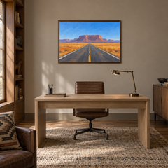 Road Toward the Mesa oil painting displayed in a natural-wood study