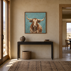 Turquoise Longhorn oil painting displayed in a Western entryway