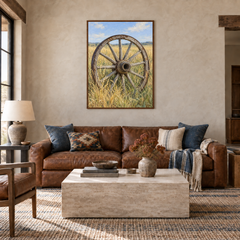 Wagon Wheel in Prairie Grass oil painting displayed in a Western ranch living room