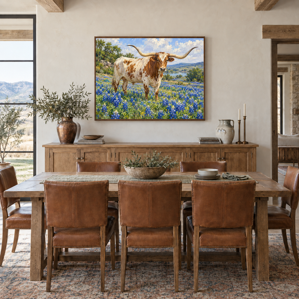 Longhorn in Bluebonnet Field oil painting displayed in a ranch dining room
