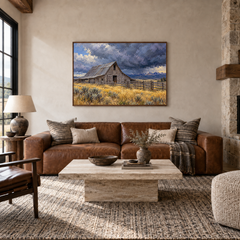 Barn Before the Storm painting framed in a ranch living room